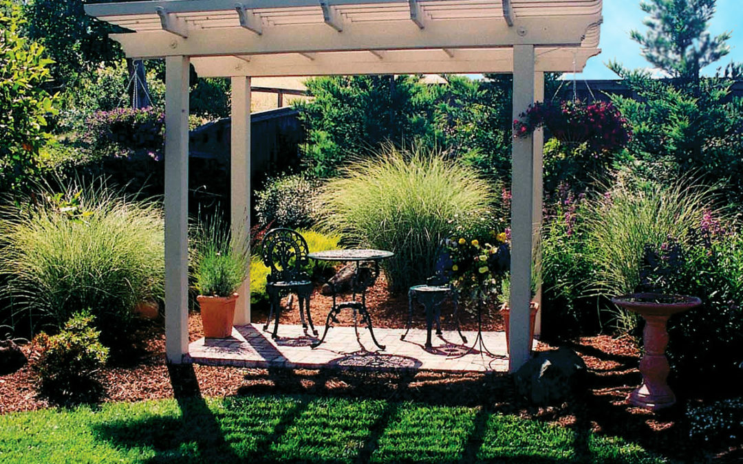 A white arbor in a peaceful setting