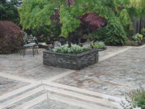 A variety of textures create an interesting patio space