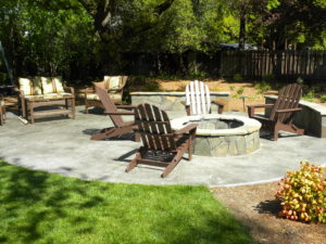 Fire pits add a central element to a backyard patio