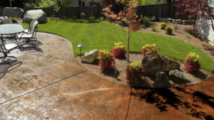 Stamped concrete patio in burnished gold tones