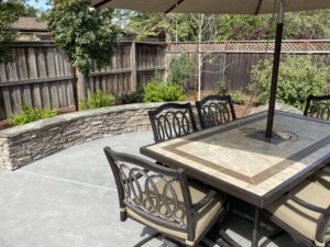 Hardscape installation of cultured stone seat wall